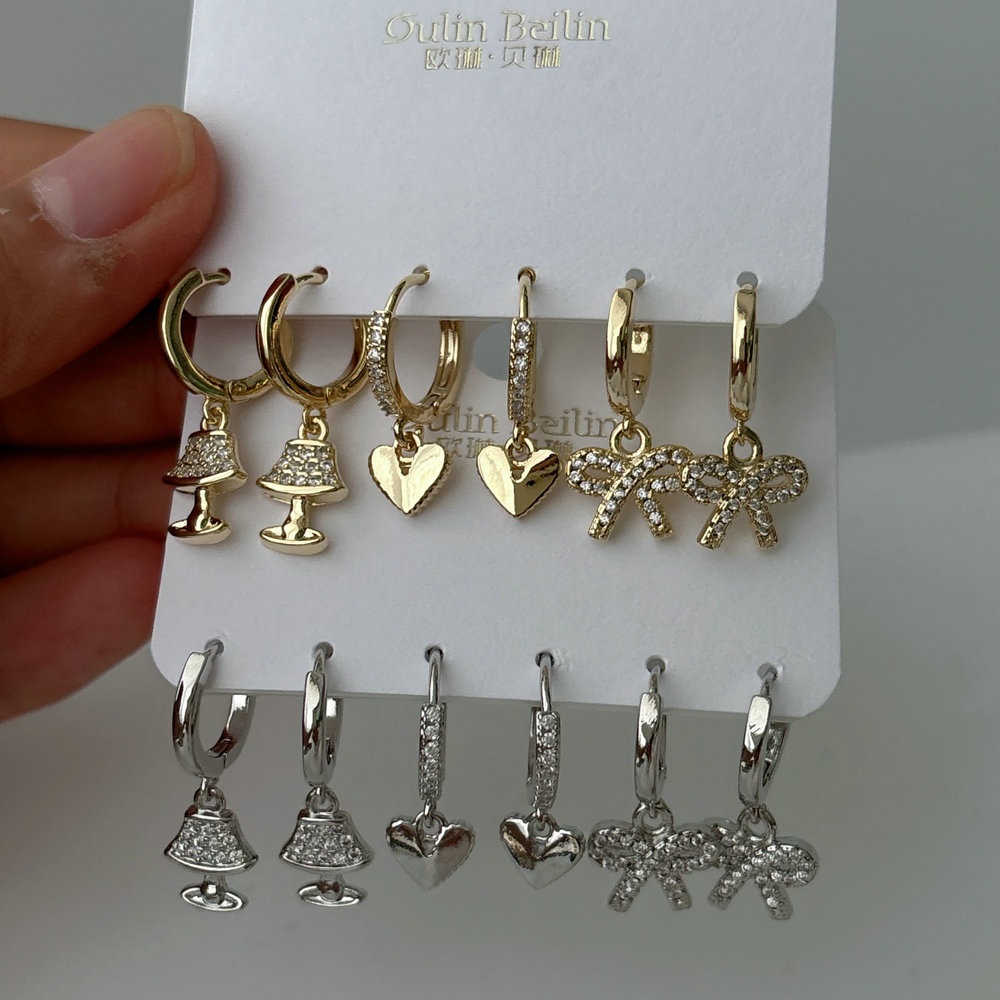 Set bow charm earrings