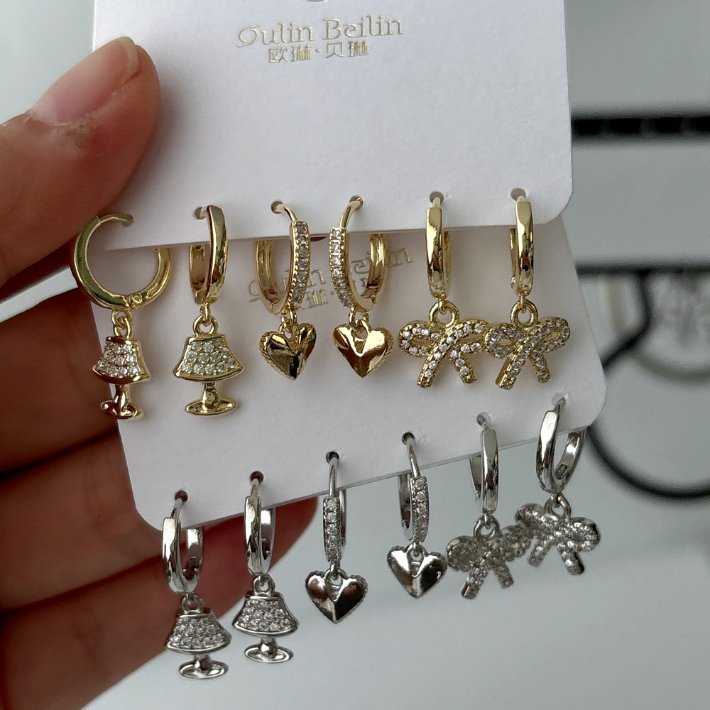 Set bow charm earrings