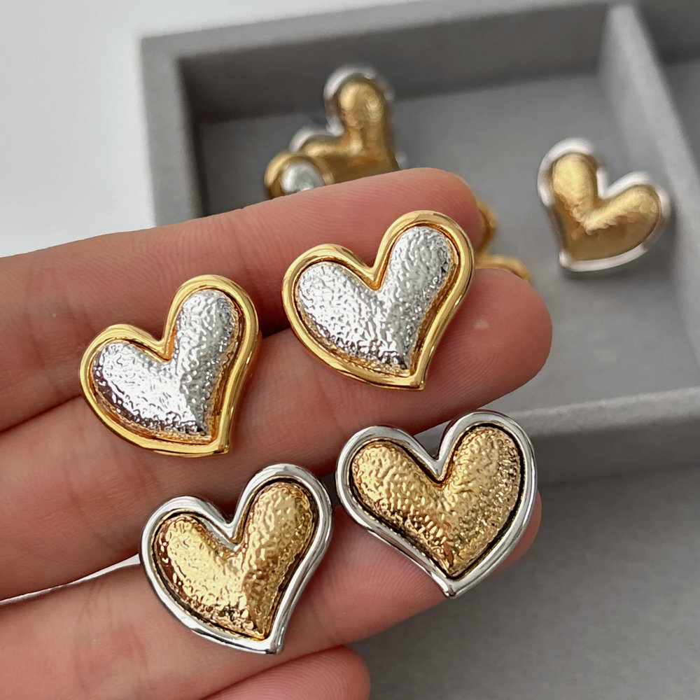 Two tone heart earrings