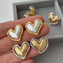 Two tone heart earrings