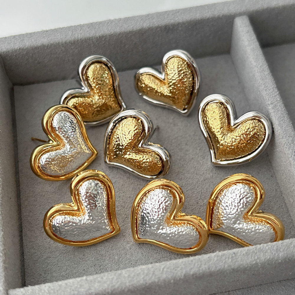 Two tone heart earrings
