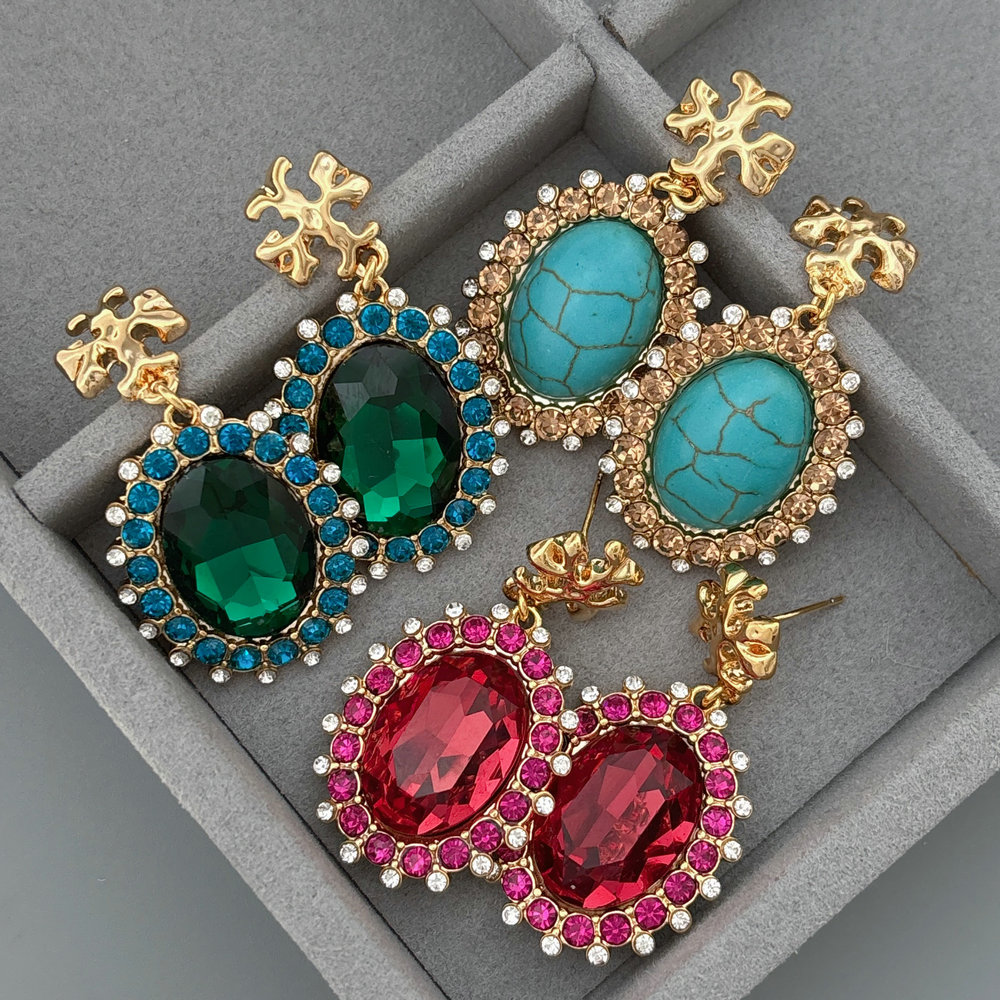 TB earrings