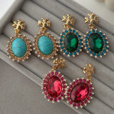 TB earrings