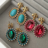 TB earrings