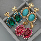 TB earrings