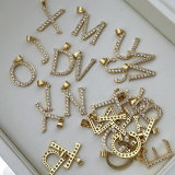 Pave zircon letter