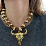 Acrylic necklace with horn pendant