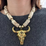 Acrylic necklace with horn pendant