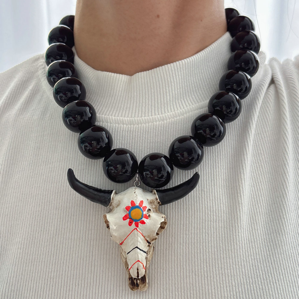 Chunky black bead necklace with bull pendant