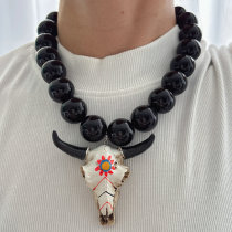 Chunky black bead necklace with bull pendant