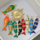 Enamel fish charm