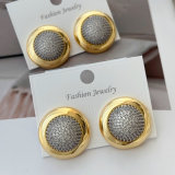 Pave zircon two tone round earrings