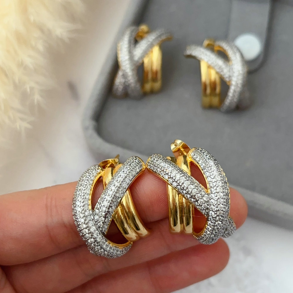 Pave zircon two tone twist earrings