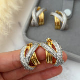 Pave zircon two tone twist earrings