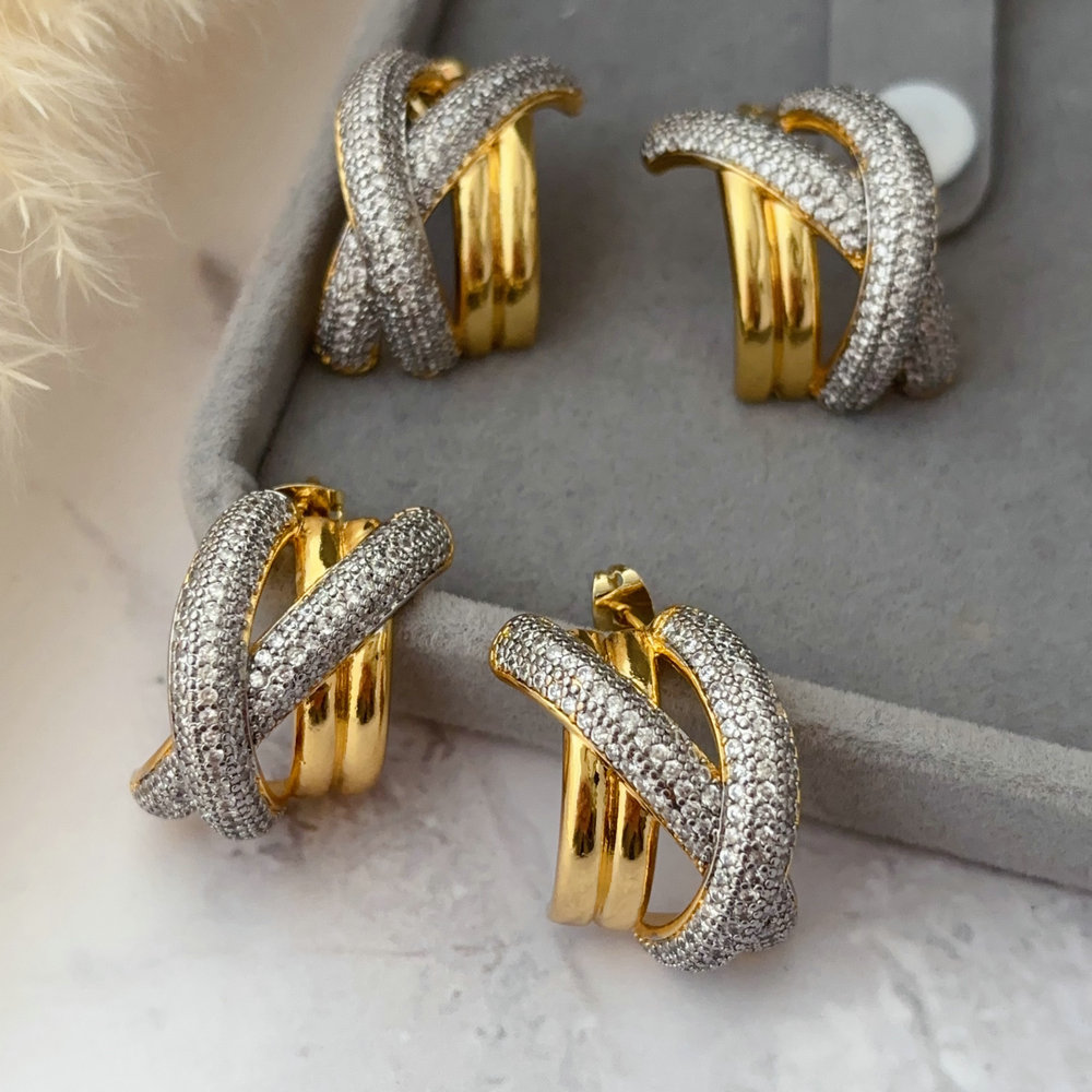 Pave zircon two tone twist earrings