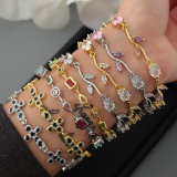 Pave flower cross bracelet