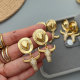 Pave zircon horn charm earrings