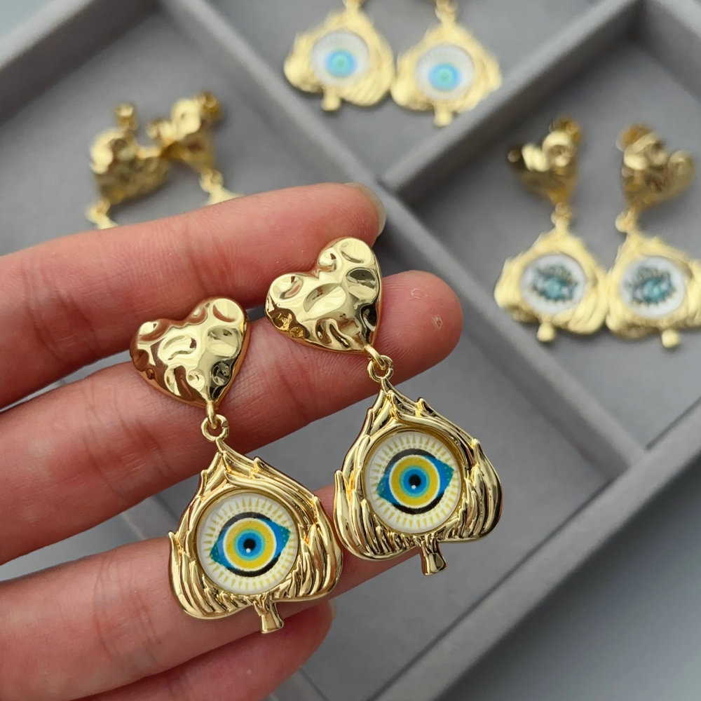 Eye charm earrings