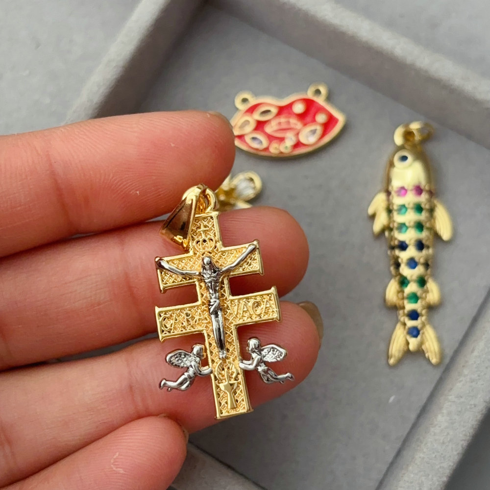 pave fish cross pendant