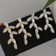 Pave zircon long leaf earrings