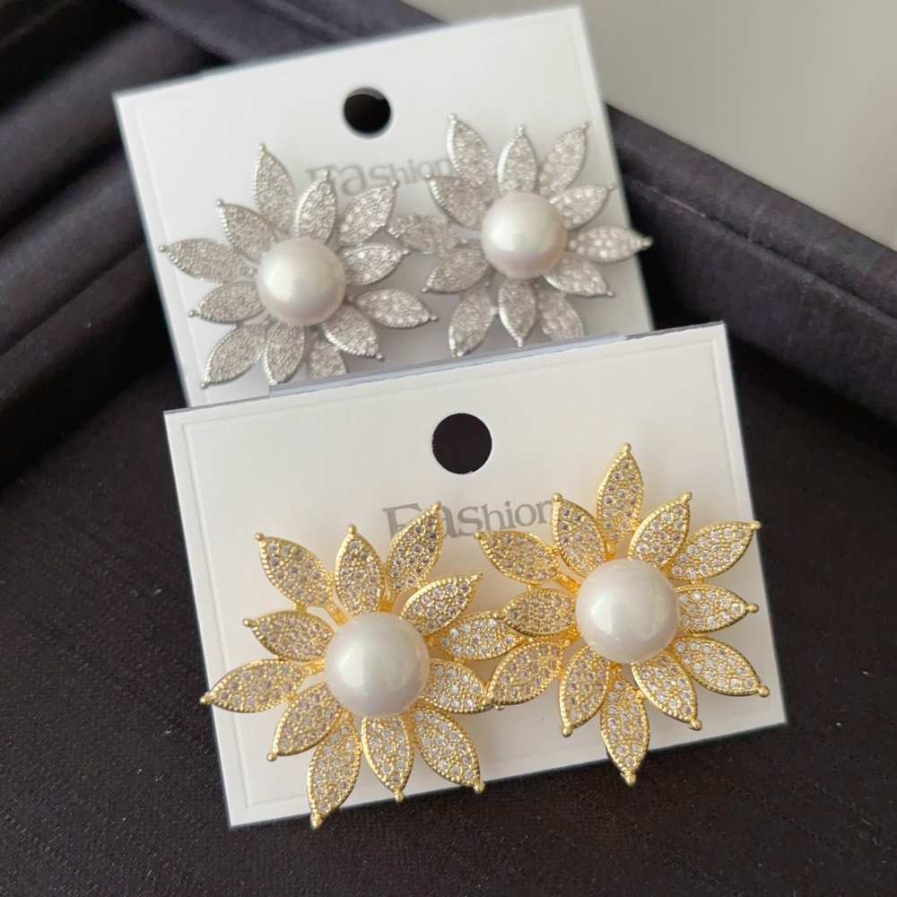 Pave sunflower pearl earrings