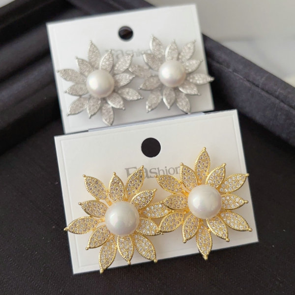 Pave sunflower pearl earrings
