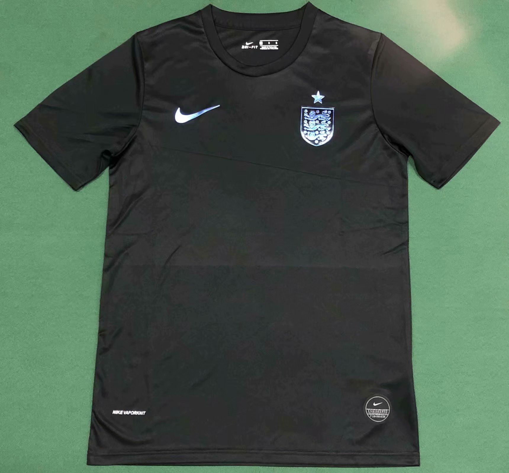 black and blue england shirt