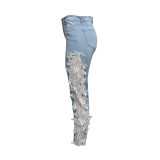 Empty washed lace panel jeans