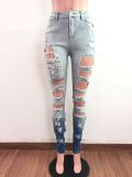 Washed worn white ripped holes gradient elastic sexy jeans