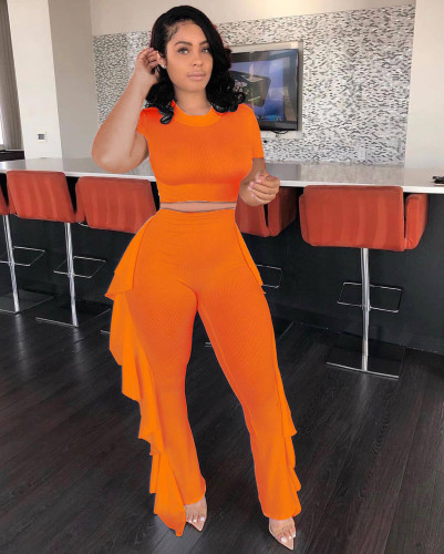 Solid color short-sleeved top, ruffled pants, pit strip, two-piece suit