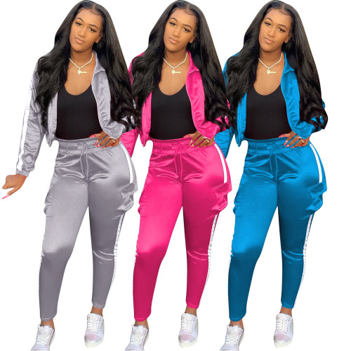 2021 autumn and winter casual women's wear solid color splicing reflective strip sports and leisure two-piece set