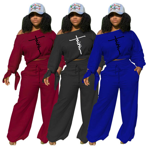 Solid color embroidered letters, knotted cuffs, loose pants casual suit