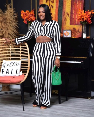 2021 autumn and winter new women's black and white stripe irregular top fashion navel exposed stripe wide leg pants two-piece set