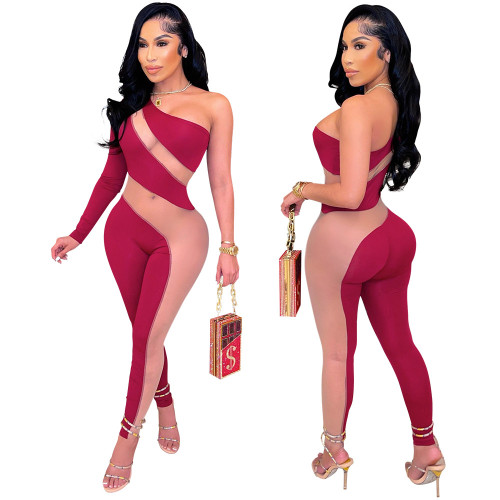 Fashion sloping shoulder tight waist color stitching sexy see-through jumpsuit