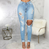 Stretch high-rise washed ripped skinny jeans