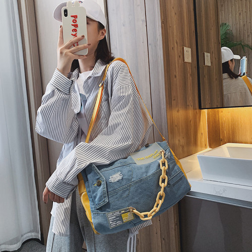 Personality creative denim stitching contrast color short-distance travel bag hand-held one-shoulder sports fitness women's bag