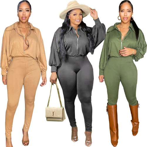Sexy solid color upper loose lower tight irregular ladies jumpsuit