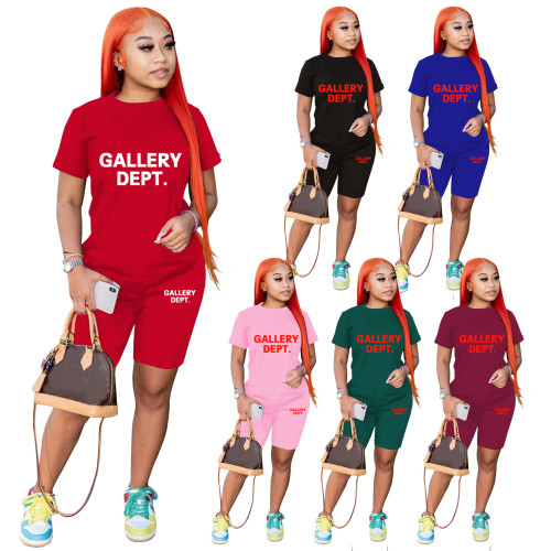 Fashion casual sports suit cartoon print solid color 2-piece women's clothing