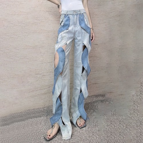 Personality niche wind jeans female 2023 autumn new fashion wild color collision twist splicing hollow pants