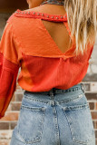 Red Studded V Neckline Exposed Seam Textured Knit Top