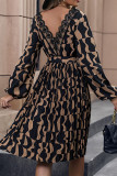 Brown Printed V Neck Pleated Dress With Sash