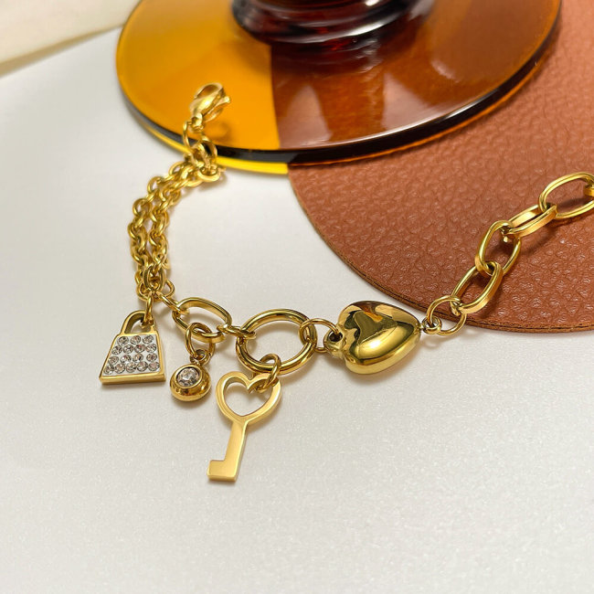 Wholesale Stainless Steel Charming Heart Lock Key Bracelet