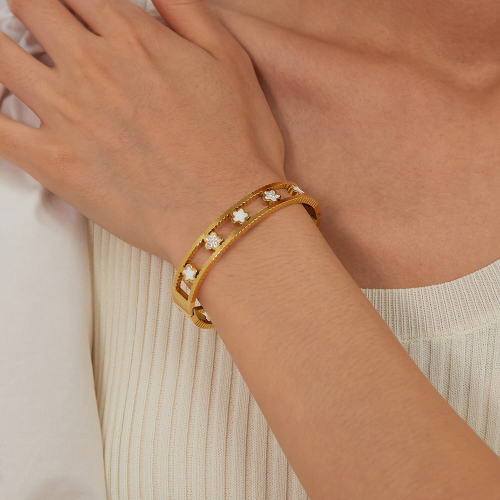 Wholesale Stainless Steel Hollow Bangle with Mother of Pearl Flower