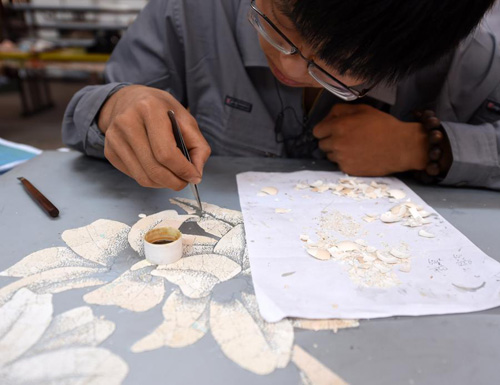 A Crafter Working on Lacquerware