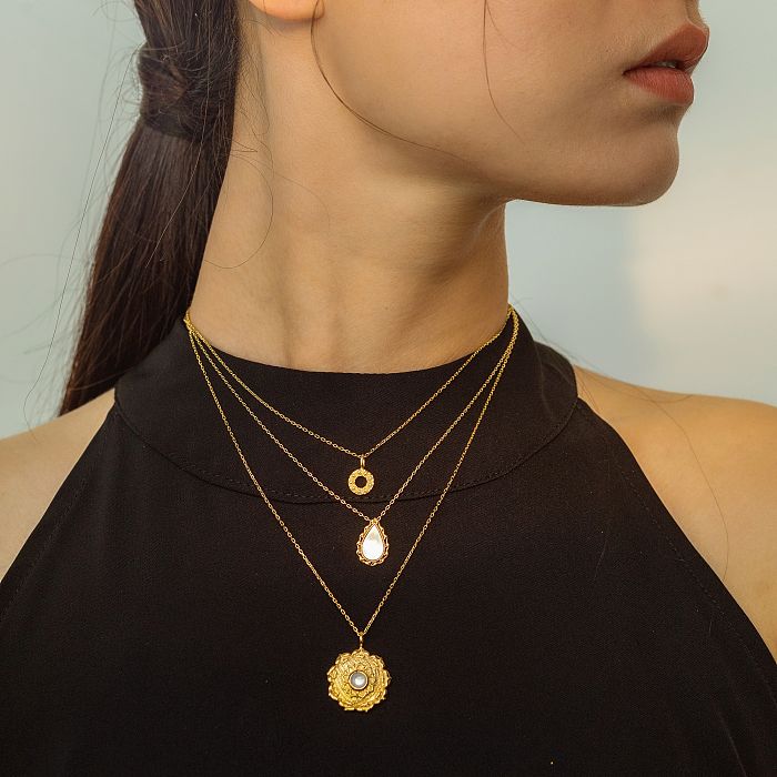 Lotus - Silk Road Necklace with Mother of Pearl inlay set in gilded sterling silver, featuring intricate Dunhuang-inspired patterns, from Light Stone Jewellery.