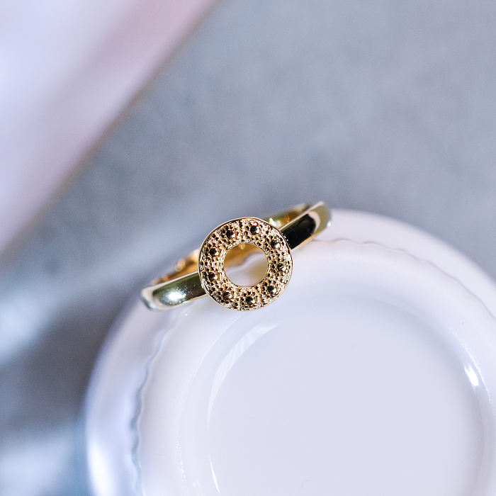 Sunrise Silk Road Sterling Silver Ring featuring a textured design with a central diamond reminiscent of Dunhuang's artistry, available at Light Stone Jewellery
