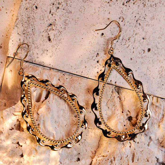 Exquisite Golden-and-Silver Honeysuckle Earrings with a teardrop void, embodying Silk Road elegance, offered by Light Stone Jewellery