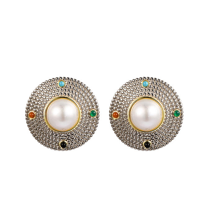 Extravagant Mabe pearl earrings with silver circles and gemstones