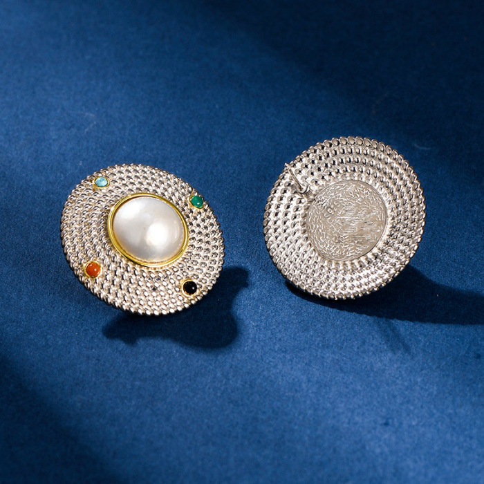 Extravagant Mabe pearl earrings with silver circles and gemstones