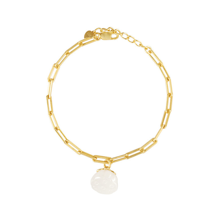 Gold bracelet with lotus pod charm